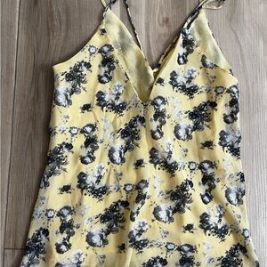 Small yellow tank with gray flowers